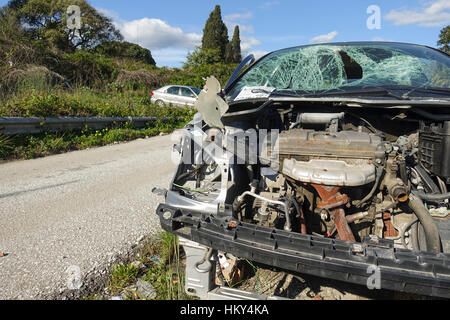 Stripped car at roadside, Spain. Stock Photo