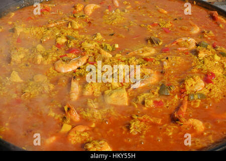Traditional spanish Paella dish being prepared on Spanish Market, Guaro, Spain. Stock Photo
