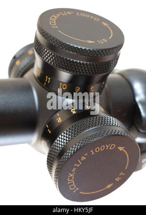 Knobs that are used to adjust windage and elevation on a rifle scope Stock Photo