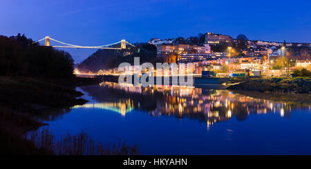 Bristol skyline at dusk with Clifton Suspension Bridge over the River Avon England. Stock Photo