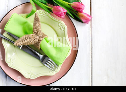 Easter table setting with fresh tulips, top view Stock Photo