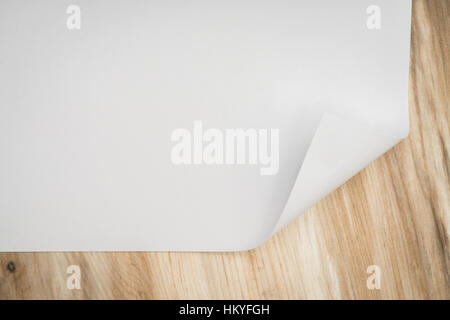 Real Paper Corner Fold on wood background Stock Photo