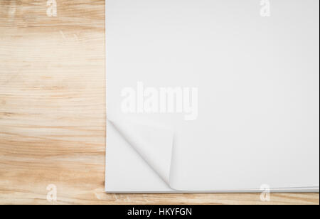 Real Paper Corner Fold on wood background Stock Photo