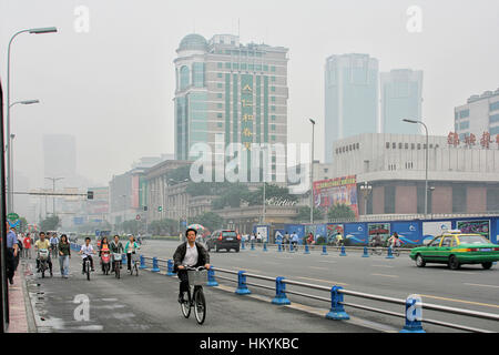 CHENGDU, CHINA - SEPTEMBER 16: Special line for bicyles, pedicabs on the multilane road on September 16, 2006 in Chengdu, Sichuan, China Stock Photo