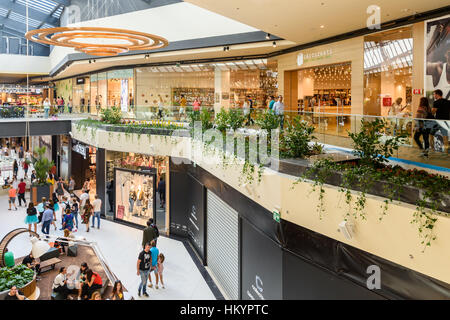 BUCHAREST, ROMANIA - SEPTEMBER 01, 2016: People Crowd Rush For Shopping In Luxury Mall Interior. Stock Photo