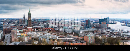 HAMBURG, GERMANY - MARCH 27, 2016: Scenic panorama view from Dancing Towers over Hamburg with Michel, Speicherstadt, harbor, and New Elbphilharmony. Stock Photo