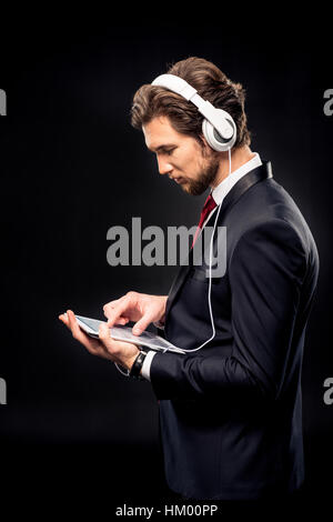 Businessman using digital tablet Stock Photo