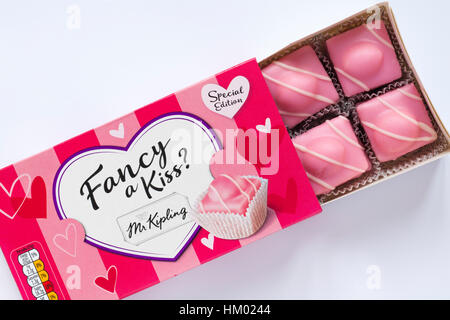 Packet of Fancy a Kiss Fondest Fancies cakes by Mr Kipling just in time for Valentines day opened to show contents set on white background Stock Photo