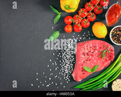 raw meat on dark background Stock Photo