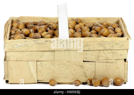 hazelnuts in a basket isolated on white background Stock Photo