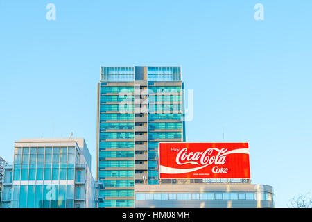 JAPAN- FEB 07: Coca-Cola advertising on FEB 07, 2016 in Japan. It is a carbonated soft drink sold in stores and restaurants in every country Stock Photo