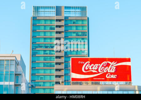 JAPAN- FEB 07: Coca-Cola advertising on FEB 07, 2016 in Japan. It is a carbonated soft drink sold in stores and restaurants in every country Stock Photo