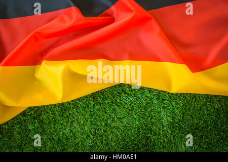 Flags of Germany on green grass Stock Photo