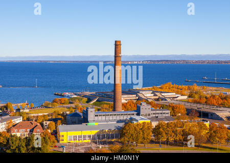 TALLINN, ESTONIA - 24 OKT 2015. Pipe of old gas factory and Linnahall, former industrial places in center of Tallinn Stock Photo