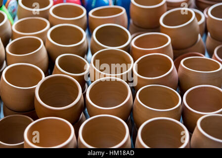 Beautiful hand made clay pots for sale at a shop. Stock Photo