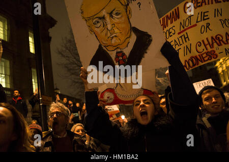 London, UK. 30th January, 2017. Demonstrators protest outside Downing Street against US President Donald Trump's ban on Muslims entering the US. The protesters also opposed British PM Theresa May's invitation to Trump for a state visit to the UK. Credit: Mike Abrahams/Alamy Live News Stock Photo