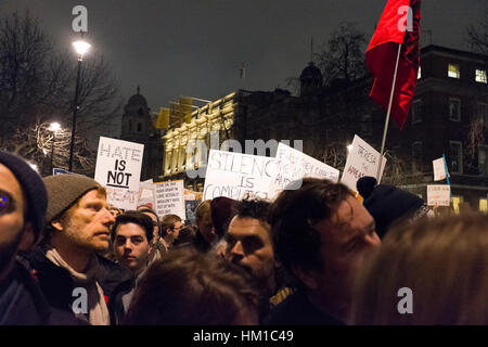 London, UK. 30th January, 2017. Protesters march during an anti-Trump demonstration outside Downing Street in Whitehall, London. Credit: Bruce Tanner/Alamy Live News Stock Photo