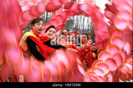 Wuhan, China's Hubei Province. 31st Jan, 2017. Participants perform dragon dance during a contest in Wuhan, capital of central China's Hubei Province, Jan. 31, 2017. Credit: Cheng Min/Xinhua/Alamy Live News Stock Photo