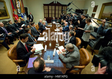 Washington, DC. 31st Jan, 2017. United States President Donald Trump holds a listening session with cyber security experts in the in the Roosevelt Room of the White House in Washington, DC. Credit: Ron Sachs/Pool via CNP /MediaPunch/Alamy Live News  Stock Photo