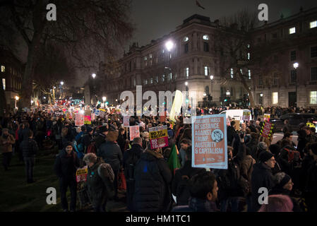 London, UK. 30th Jan, 2017. Thousands of protesters at Downing Street, opposing Donald Trump's controversial travel ban. Anger opposing Trump has grown after he signed an executive order preventing citizens from a number of Muslim-majority countries from entering the US. Credit: Alberto Pezzali/Pacific Press/Alamy Live News Stock Photo