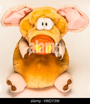 toy stuffed pig in sitting position Stock Photo