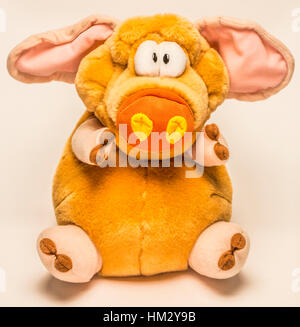 toy stuffed pig in sitting position Stock Photo