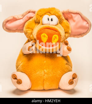 toy stuffed pig in sitting position Stock Photo