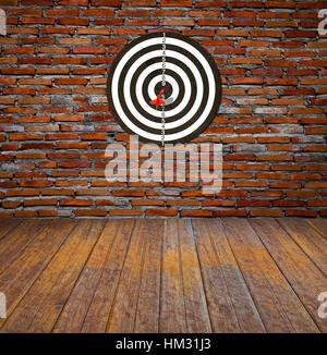 Dartboard on brick wall (miss darts) Stock Photo