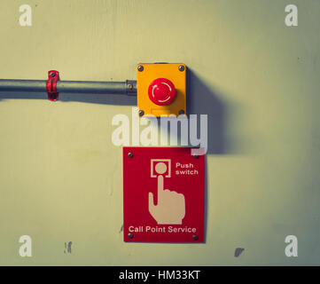 Call point service Button  ( Filtered image processed vintage effect. ) Stock Photo