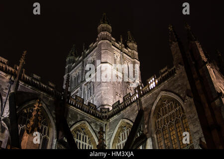 Bath Abbey tower and clock at night, from south. One of Britain's grandest and most imposing Cathedrals looking up from close by Stock Photo