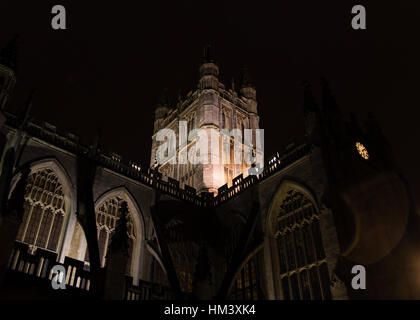 Bath Abbey tower and clock at night, from north. One of Britain's grandest and most imposing Cathedrals looking up from close by Stock Photo