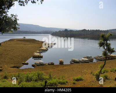 Boating, Koyna dam backwaters. Tapola, Maharasthra, India. The Koyna Dam is one of the largest dams in Maharashtra, India. Stock Photo