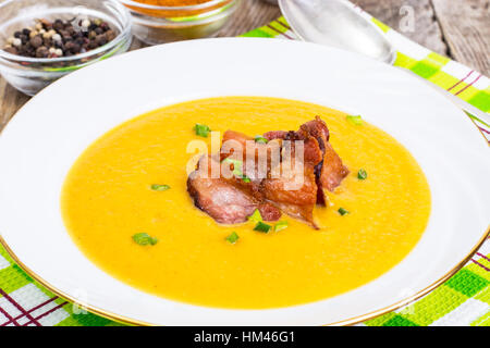 Pumpkin puree soup with bacon Stock Photo