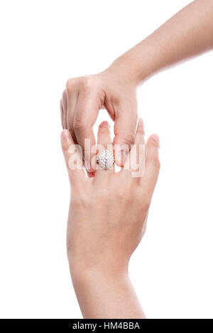 Engagement Ring in hand isolate on white background Stock Photo