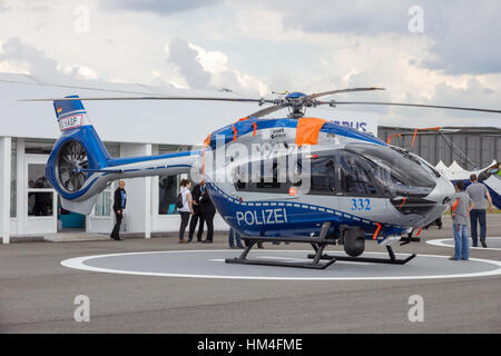 BERLIN - JUN 2, 2016: Brand new German Police Eurocopter H145 helicopter on display at the Berlin Airshow ILA on Berlin-Schoneveld airport Stock Photo