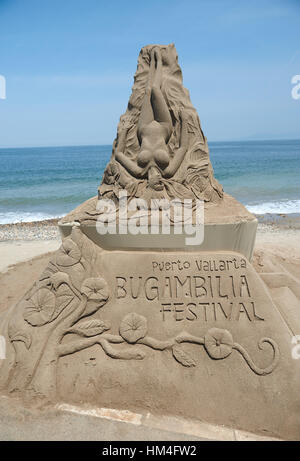 big sand statue on summer ocean beach Stock Photo