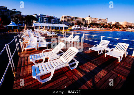 Close up of white sun loungers in France Stock Photo