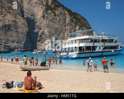 Tourist ship at Shipwreak beach. The most beautiful beach of Zakynthos, one of the five or six most photographed beaches of all Greece Stock Photo
