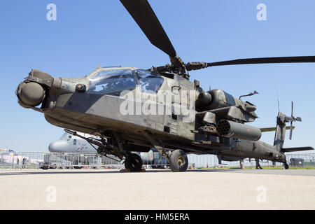 BERLIN, GERMANY - MAY 22, 2014: US Army Boeing AH-64D Apache Longbow attack helicopter at the International Aerospace Exhibition ILA. Stock Photo