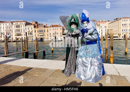 VENICE - FEBRUARY 7: Costumed people on the Piazza San Marco during Venice Carnival on February 7, 2013 in Venice, Italy. This year the Carnival was h Stock Photo