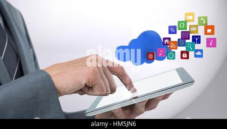 Hand using digital tablet against digitally generated application icons Stock Photo