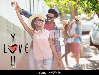 Happy couple dancing on street Stock Photo