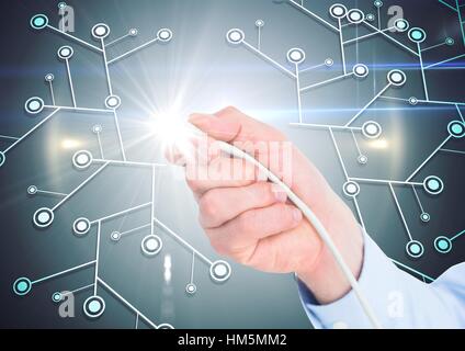 Man hand with cable and flare against digitally generated network icon Stock Photo