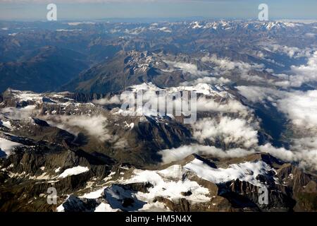 Looking down to volcanic craters and glaciers in the alps Stock Photo