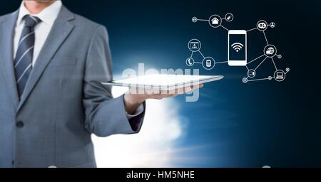 Mid section of businessman holding digital tablet Stock Photo