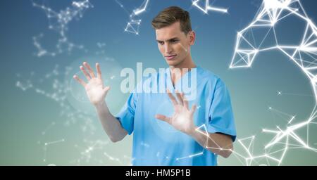 Doctor using interface against blue green background Stock Photo