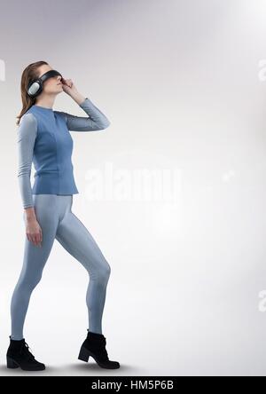 Businesswoman using virtual reality headset Stock Photo