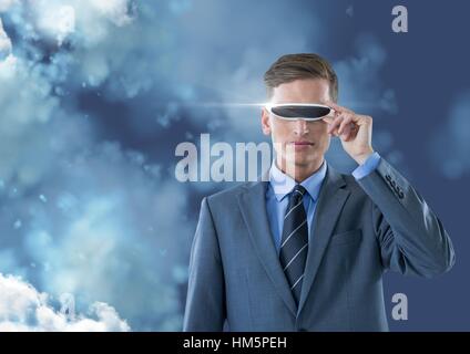 Businessman using virtual reality headset Stock Photo