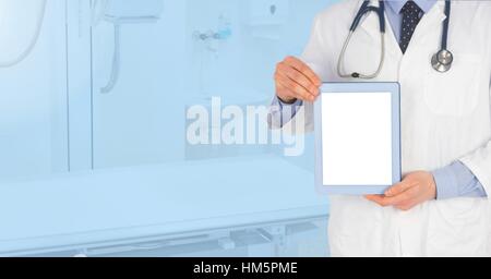 Doctor holding digital tablet Stock Photo