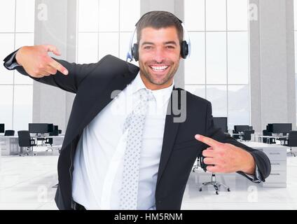 Businessman with headphones posing in office Stock Photo